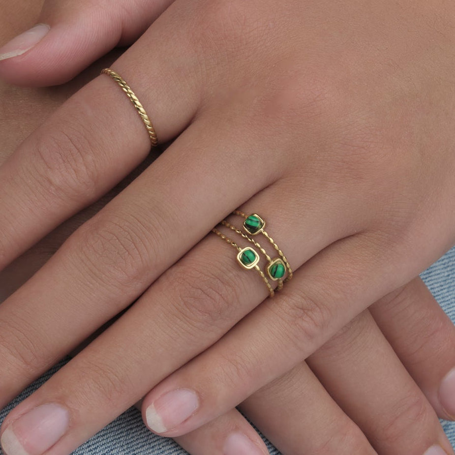 Ring three gems green