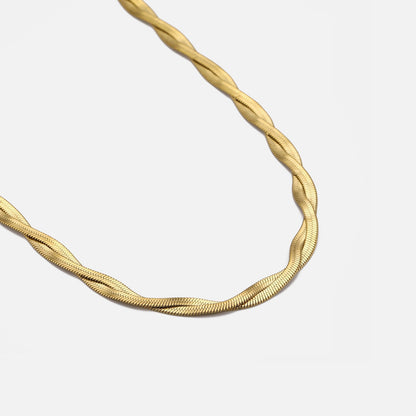 Platte gedraaide ketting goud